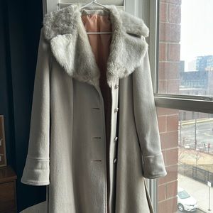 Vintage women’s fur coat with belt
